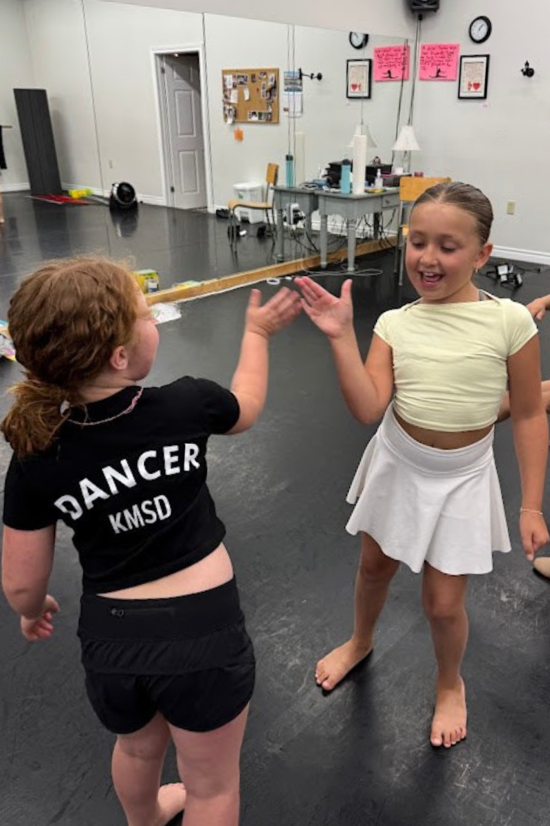 two dancers in dance class at KMSD